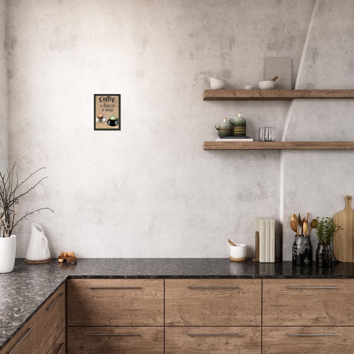 Eingerahmtes Bild mit der Überschrift: "Coffee" und dem Titel: "a hug in a mug" mit zwei Tassen Kaffee auf einem Beigen Hintergrund über einer Küche an der Wand hängend