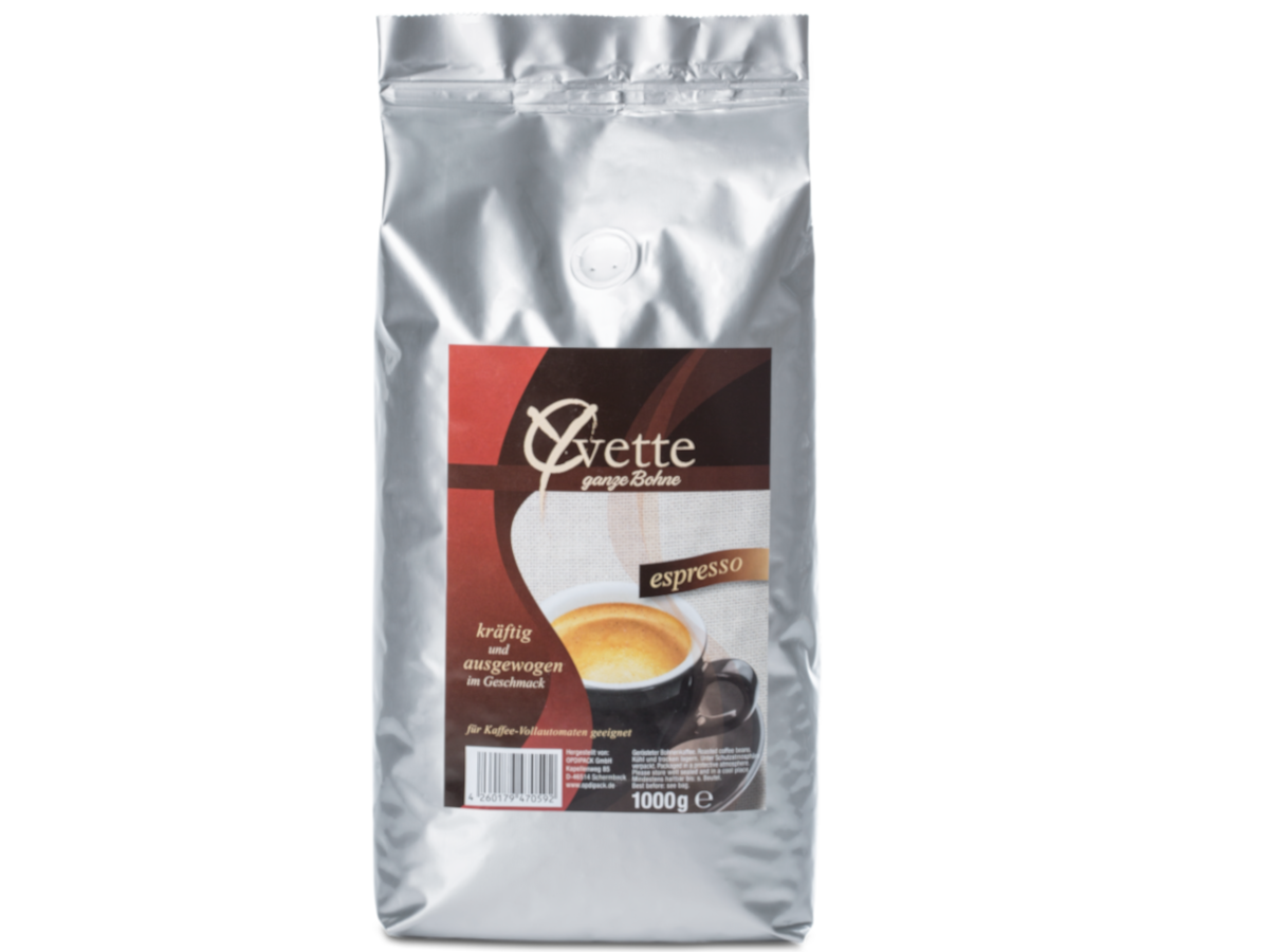 Ein silberner Beutel mit 1000g frisch gerösteten Espresso-Kaffeebohnen der Marke Yvette Kaffee. Der Beutel zeigt das Logo der Marke und die Produktbezeichnung. 
