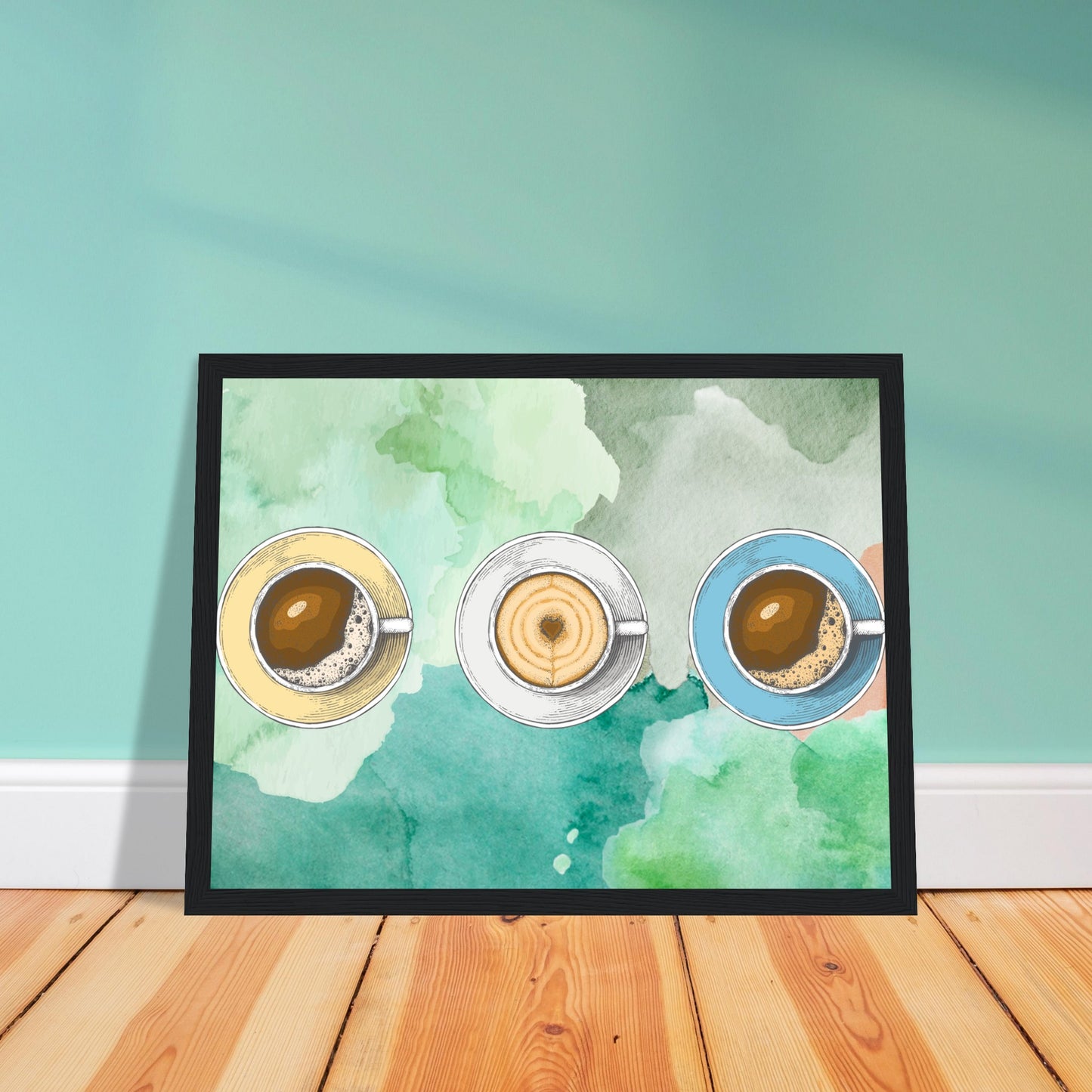 Ein Bild im Schwarzem Rahmen mit buntem Hintergrund in Wasserfarben. Im Vordergrund Sind Drei Tassen Kaffe. Eine Tasse Beige, Weiß und Blau. Das Bild steht auf dem Boden und ist an der Wand angelehnt.