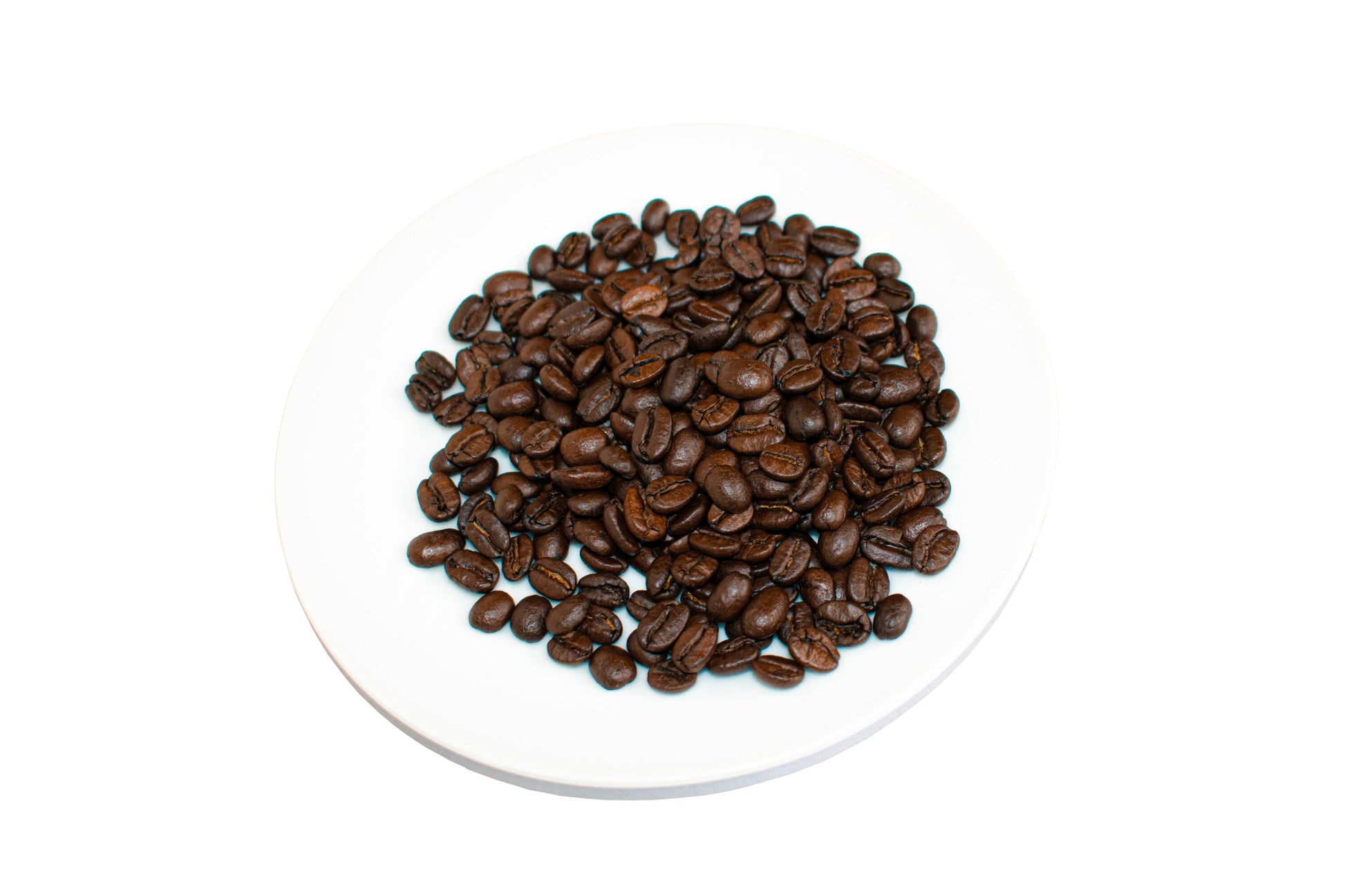 Ein Teller mit einen Haufen Espresso Kaffeebohnen