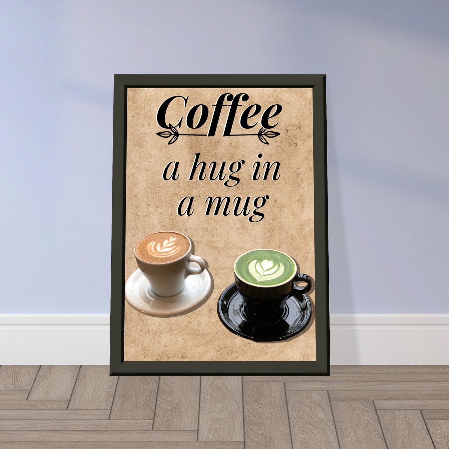 Eingerahmtes Bild mit der Überschrift: "Coffee" und dem Titel: "a hug in a mug" mit zwei Tassen Kaffee auf einem Beigen Hintergrund an einer Lila wand lehnend