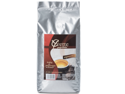 Ein silberner Beutel mit 1000g frisch gerösteten Espresso-Kaffeebohnen der Marke Yvette Kaffee. Der Beutel zeigt das Logo der Marke und die Produktbezeichnung. 